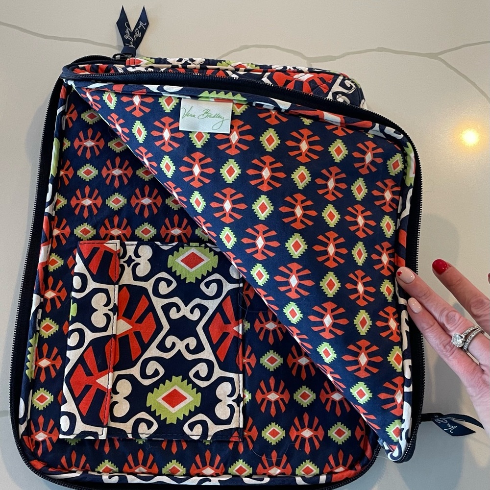 Vera Bradley Laptop Case. One velcro interior pocket. Machine wash.